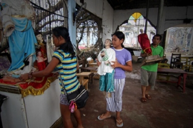 Buddhist charity comes to Philippine church`s rescue