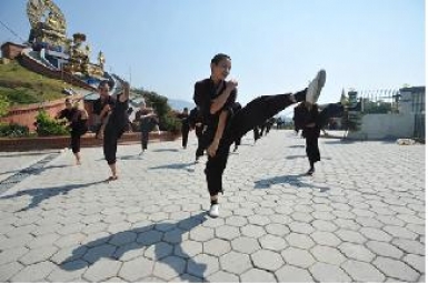 Nepal’s kung fu nuns practise karma with a kick
