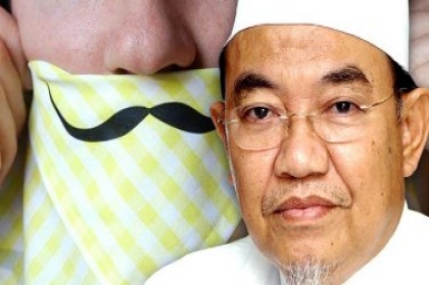 Islam twisted in M`sia? Hankies are for blowing noses, NOT beating wives