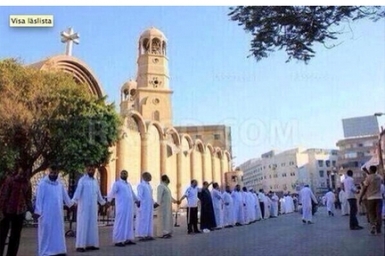 Viral photo shows Muslims defending Catholic church in Egypt