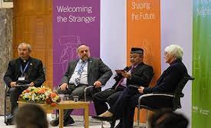 Interfaith conference highlights how Christian, Muslim and Jewish groups are working to ‘welcome the stranger’
