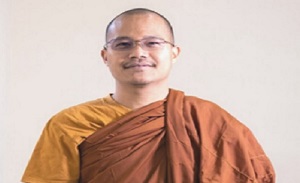A monk from Mandalay studying dialogue to heal his land