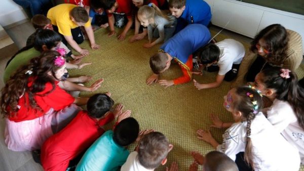 Global aid experts strengthen outreach and advocacy efforts assisting children